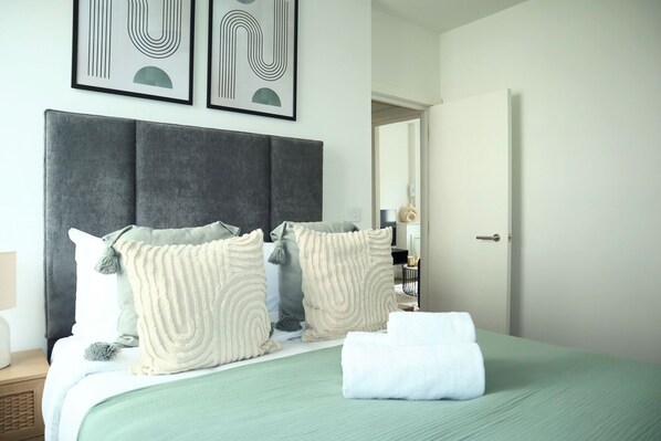 1 bedroom, desk, iron/ironing board, travel cot