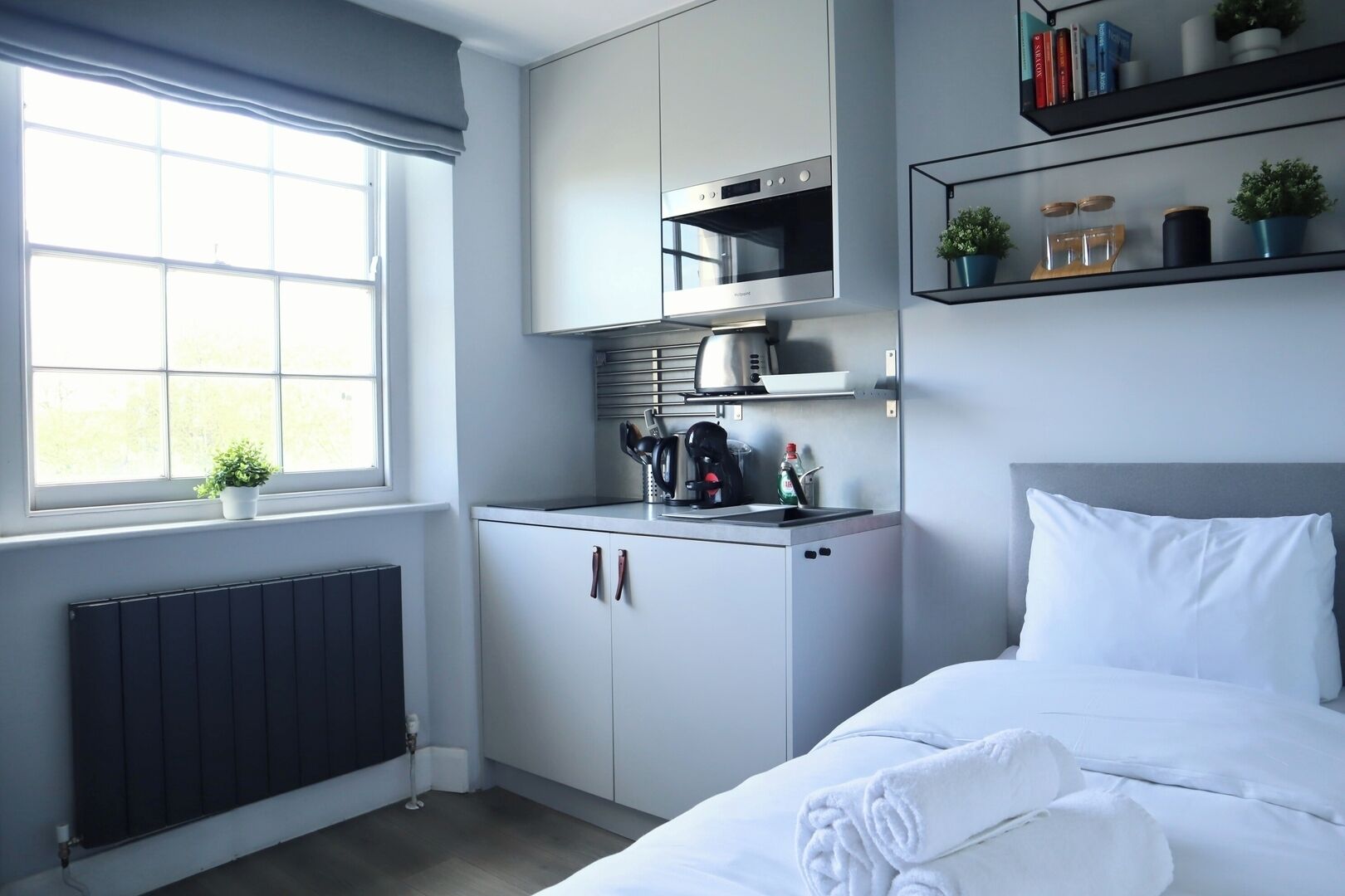 1 bedroom, desk, iron/ironing board, travel cot