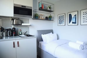 1 bedroom, desk, iron/ironing board, travel cot