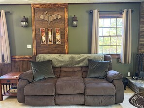 Living area - Peaceful Rexton retreat on 20 acres, right next to snowmobile and ORV trails! (Naubinway)