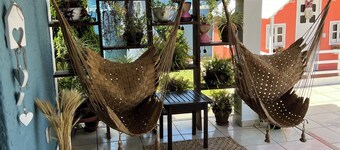 Casa de praia pé na areia. Aconchegante, elegante e muito delicada.