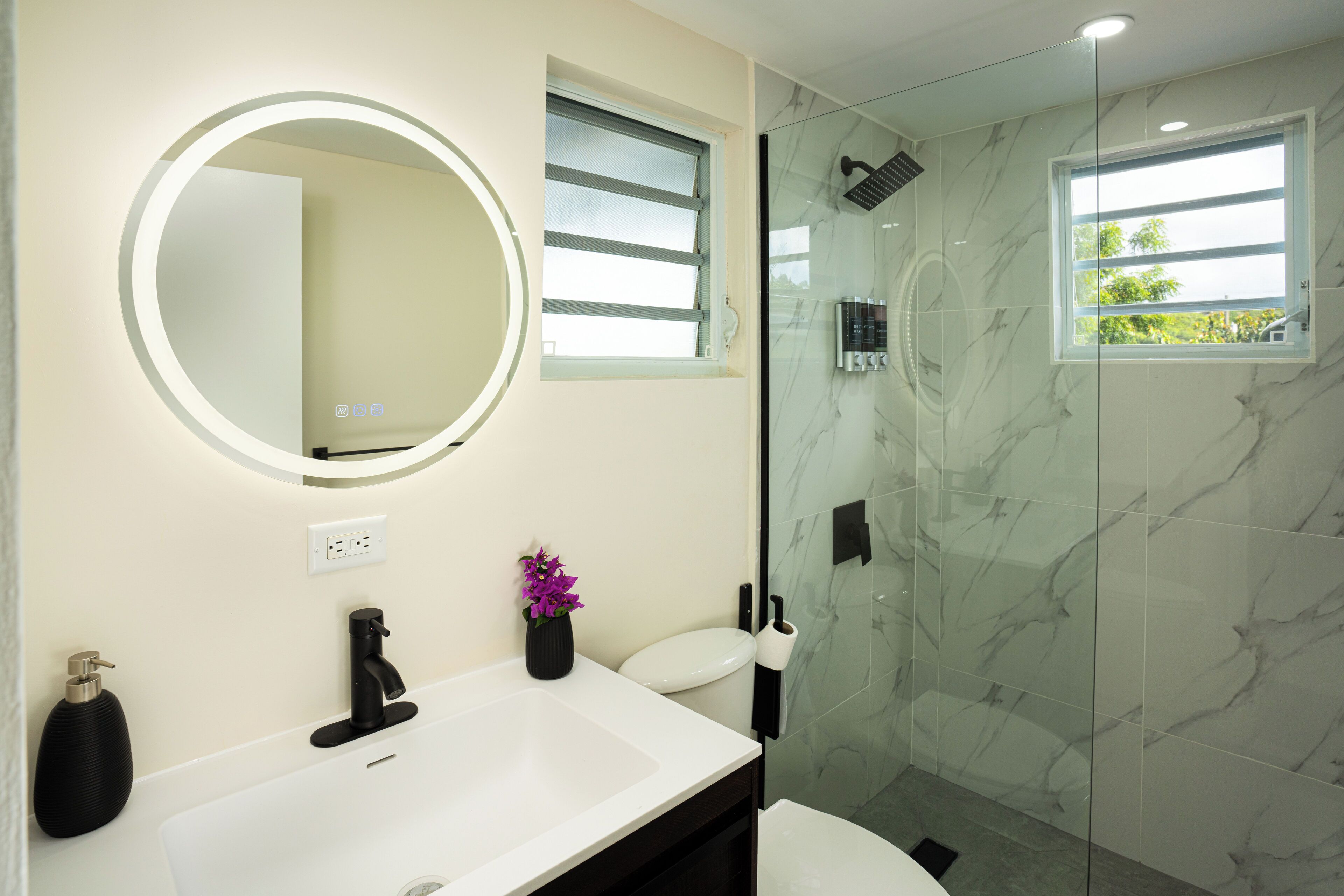 Shower, hair dryer, towels, soap