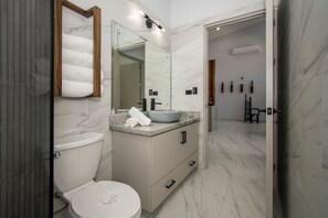 Shower, towels, soap, shampoo