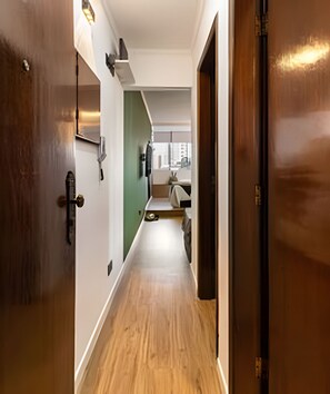 Apartamento | Roupas de cama premium, escrivaninha, espaço de trabalho para notebook