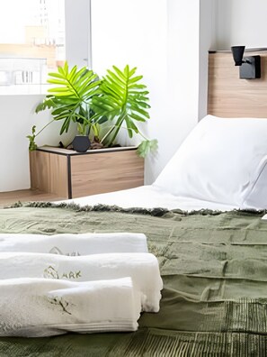 Apartamento | Roupas de cama premium, escrivaninha, espaço de trabalho para notebook