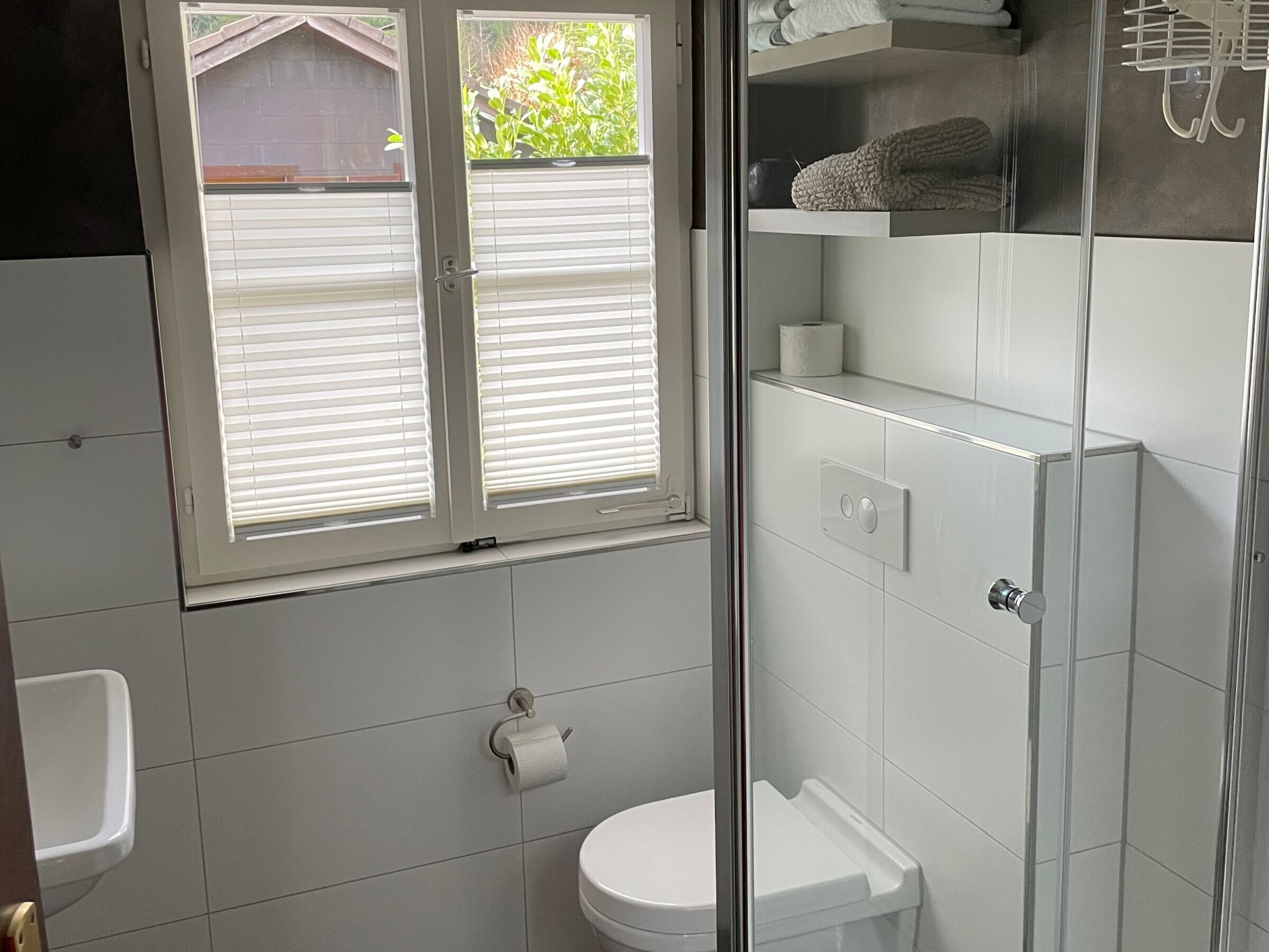 Ducha, secador de pelo, toallas