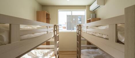 Blackout curtains, free cots/infant beds, free WiFi, bed sheets