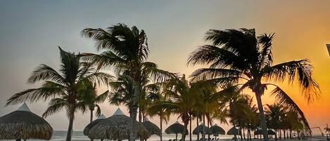 On the beach, sun loungers