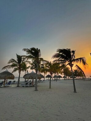 On the beach, sun loungers