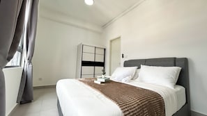 Apartamento, 2 quartos | Ferros/tábuas de passar roupa, roupa de cama