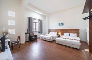 Deluxe Quadruple Room, City View | Blackout drapes, soundproofing, iron/ironing board, free WiFi - LiLLy Hotel Da Lat (Da Lat)