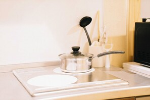 Fridge, microwave, stovetop, cookware/dishes/utensils