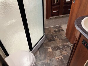 Shower, hair dryer, towels, soap - Charming RV with AC and WiFi. (Greenough)