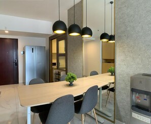 Apartamento família, sacada | Área de estar