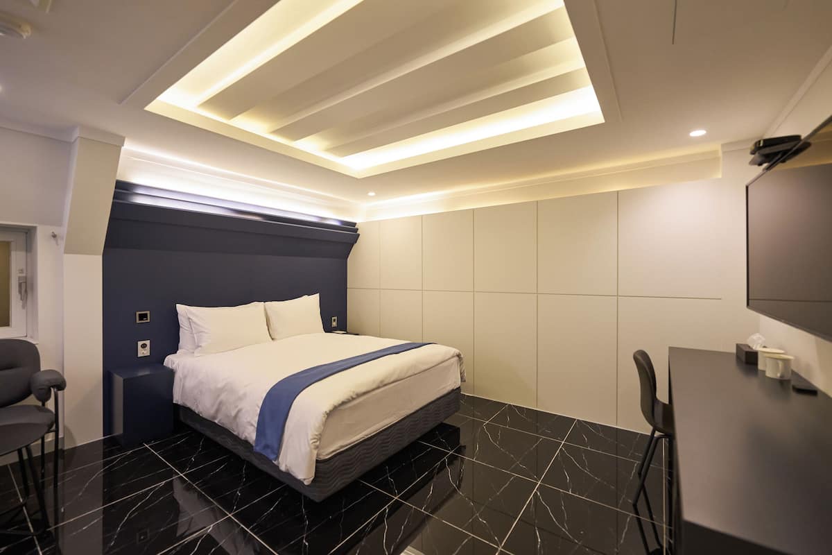 Desk, laptop workspace, blackout curtains, free WiFi