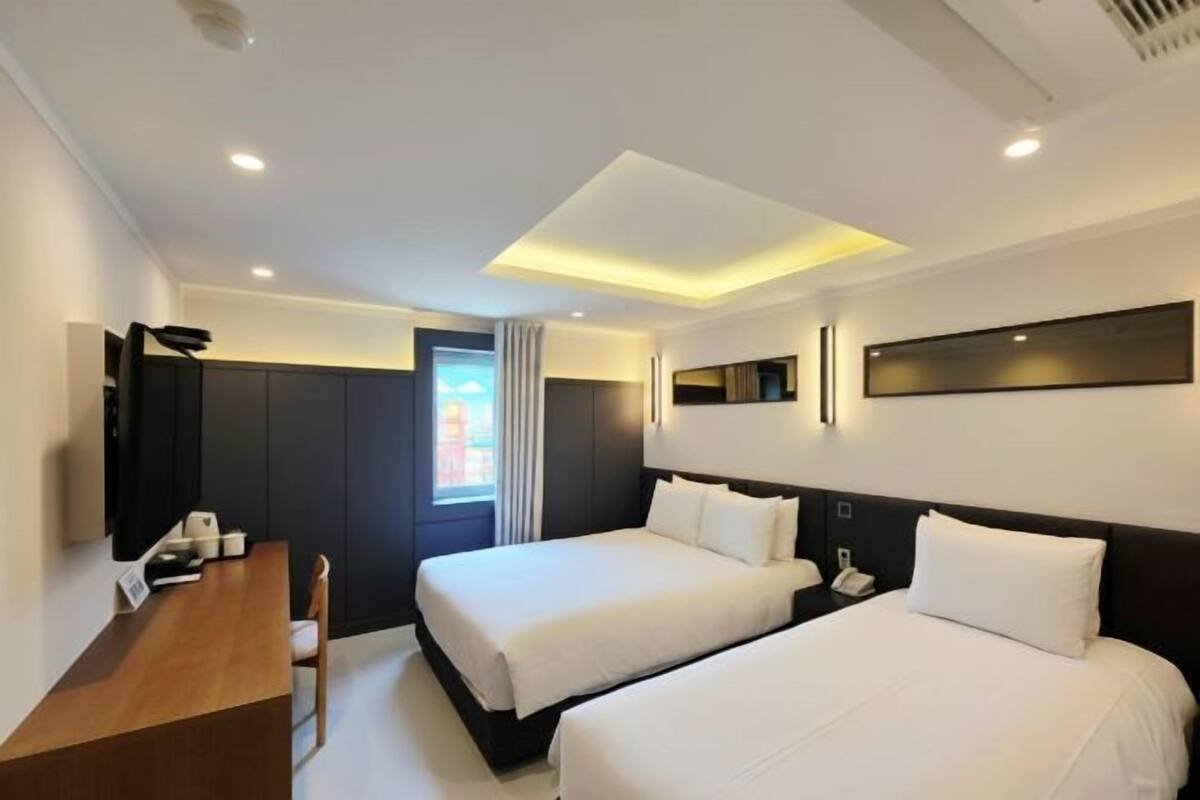Desk, laptop workspace, blackout curtains, free WiFi