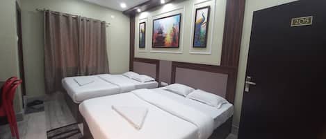 Deluxe Quadruple Room, City View | Free WiFi