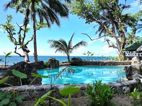 Outdoor pool, pool umbrellas, sun loungers