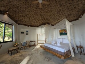 Villa, Pool View, Beachfront | 1 bedroom, individually decorated, individually furnished, desk