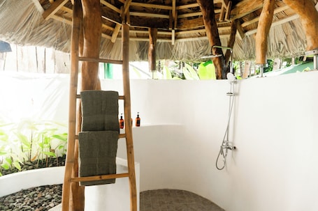 Villa, Pool View, Beachfront | Bathroom | Shower, bidet, towels, soap. Balihao Resort