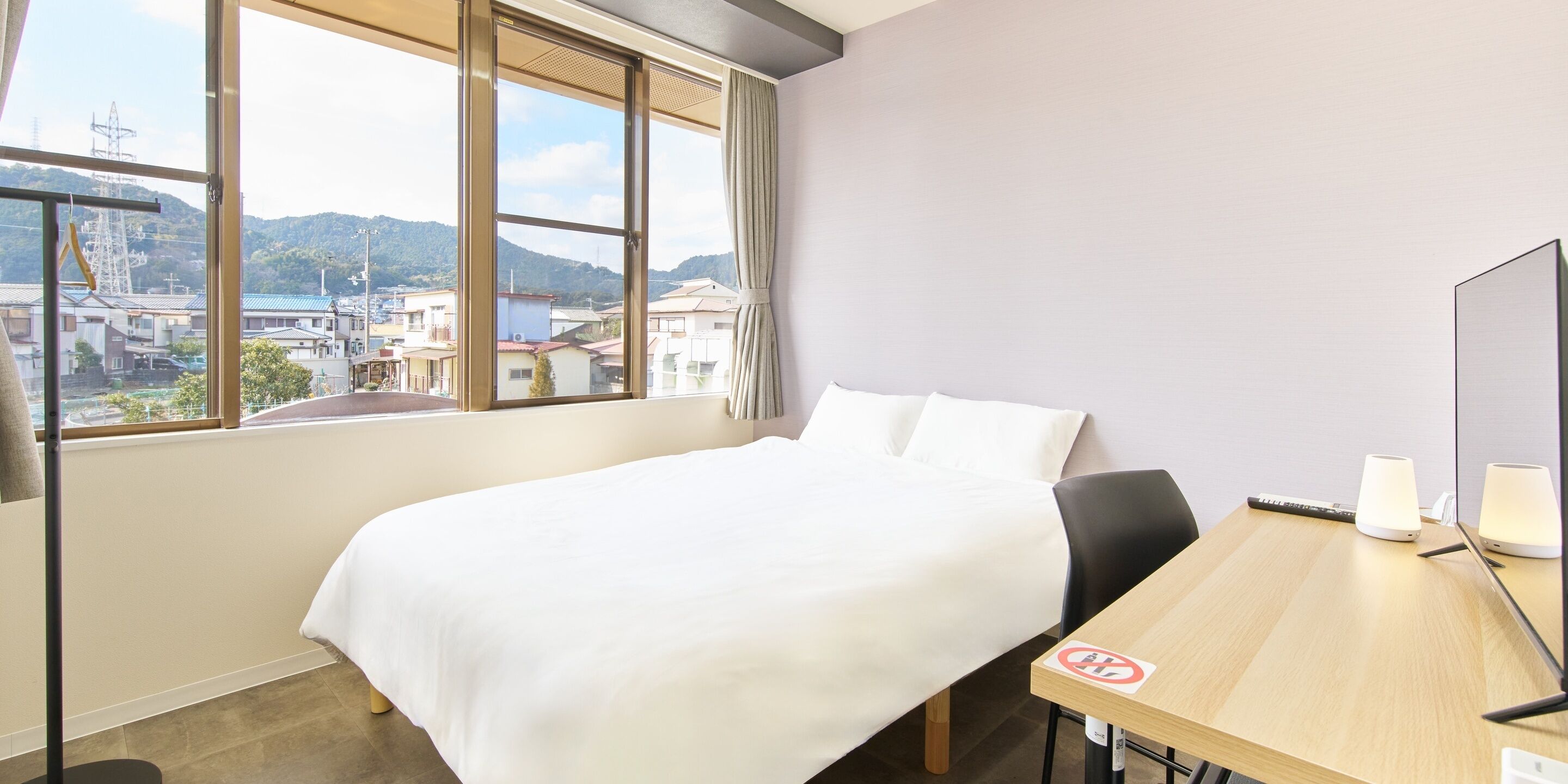 Basic Double Room, City View | In-room safe, blackout drapes, iron/ironing board, free WiFi