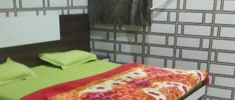 Deluxe Quadruple Room, City View | In-room safe, soundproofing, free WiFi