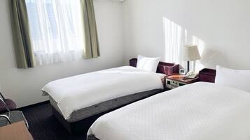 Escritorio, wifi gratis y ropa de cama