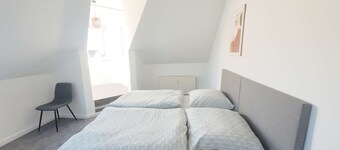 Large apartment with 4 bedrooms and living room.