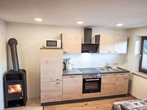 Fridge, oven, cookware/dishes/utensils