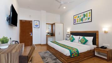 Cortinas blackout y tabla de planchar con plancha