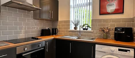 Fridge, oven, electric kettle, toaster