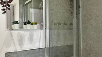 Shower, towels, soap, shampoo