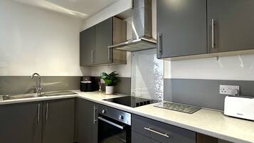 Fridge, oven, electric kettle, toaster