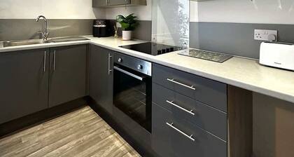 Ideal Wigan Base: 1BR for Cosy Stays