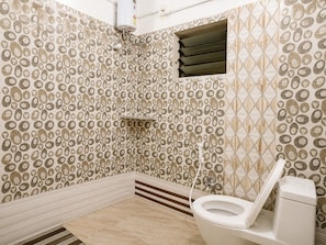 Shower, free toiletries, slippers, towels - Hotel Eden Inn Puri - Near Jagannath Temple And Golden Sea Beach (Puri)