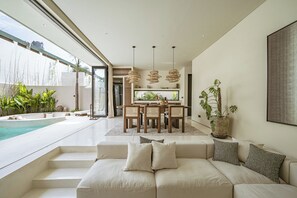 Luxury Villa, Pool View | Living area | 54-inch Smart TV with cable channels - Villa Bōld 06 At Bōld - Luxury Villas (Pecatu)