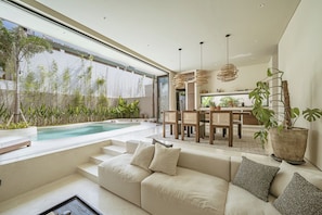 Luxury Villa, Pool View | Living area | 54-inch Smart TV with cable channels - Villa Bōld 06 At Bōld - Luxury Villas (Pecatu)