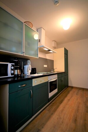 Réfrigérateur, four, plaque de cuisson, lave-vaisselle