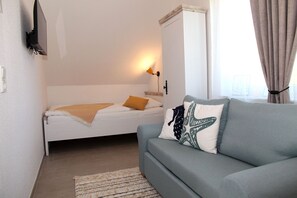 3 slaapkamers, een strijkplank/strijkijzer, wifi