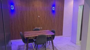 Junior Apartment, Balcony, City View | Dining room