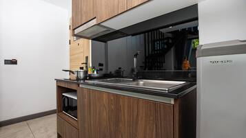 Apartamento de diseño, 1 habitación, balcón | Cocina privada | Hervidor eléctrico