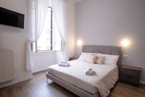 3 habitaciones, tabla de planchar con plancha, wifi y ropa de cama 