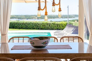 Dining - Holiday Home 'Flora Sea View' with Sea View, Wi-Fi and Air Conditioning (Punta de su Torrione)