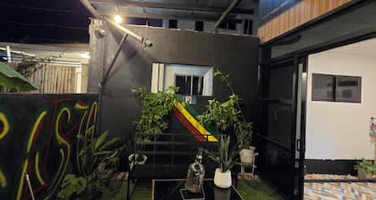 Summers Transient house with AC, WiFi in tranquil Digos City