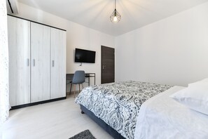 1 chambre, fer et planche à repasser, Wi-Fi gratuit, draps fournis