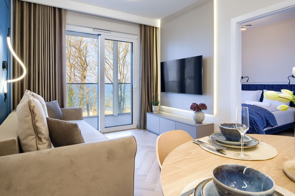 Apartament (218) with sea view | Living area | Flat-screen TV