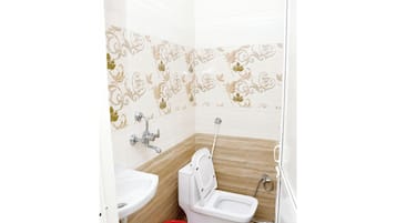 Shower, free toiletries, slippers, soap