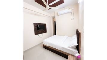 Chambre Double Standard, plusieurs lits, climatisation | Vue de la chambre