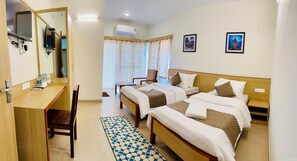 Deluxe Twin Room, City View | Premium bedding, desk, laptop workspace, rollaway beds