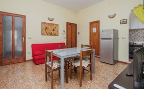 Classic Apartment | Living area | 32-inch flat-screen TV with digital channels - Kokka House (Marsala)